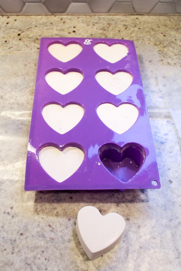 Remove ArtPlaster hearts from the silicone mold to begin working on your kindness rocks.